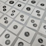 Close up shot of Panaeolus cyancescens Nec'D spore prints on aluminum foil.